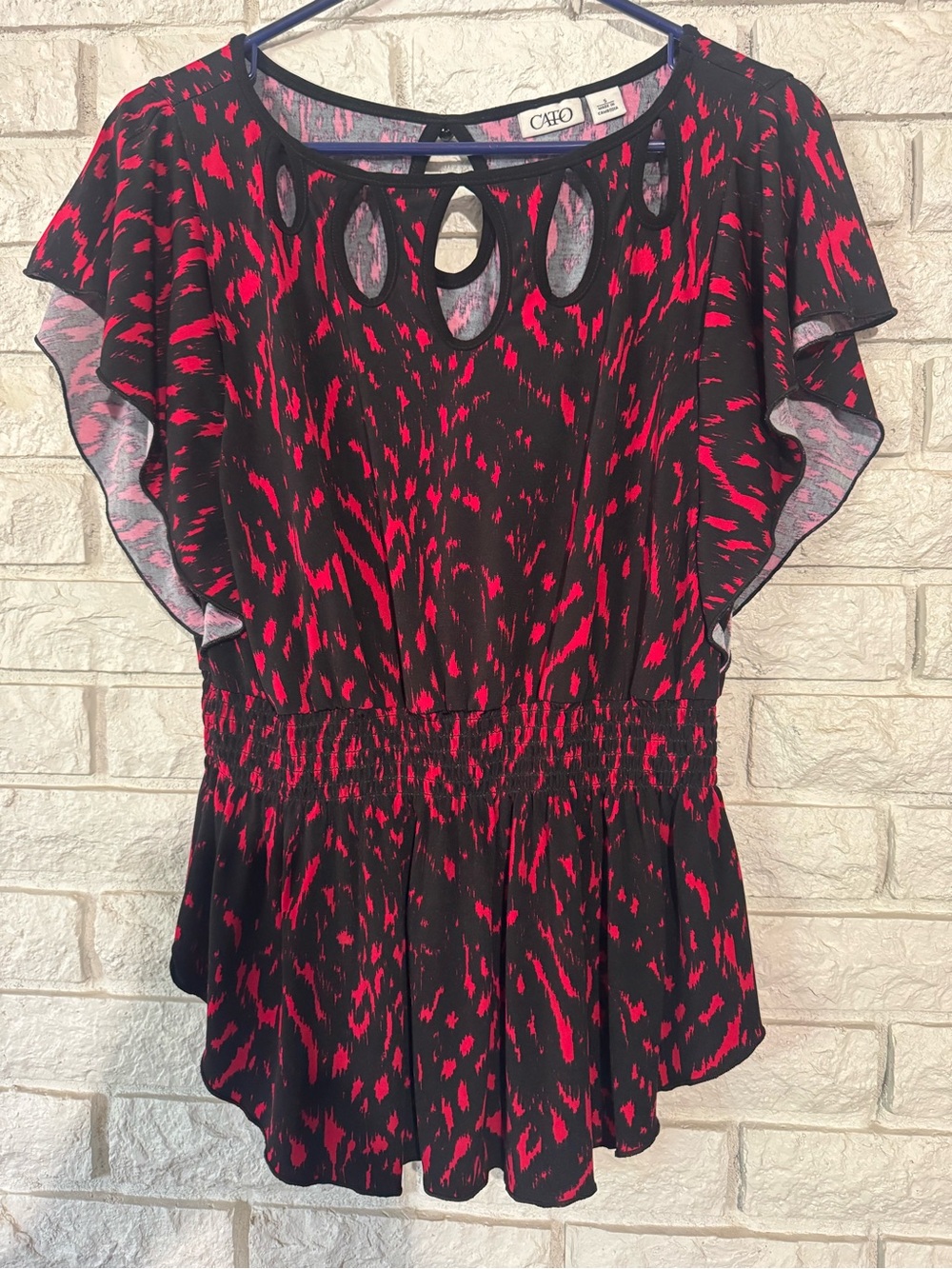 Cato Abstract Animal Print Cutout Neckline Smocked Peplum Top 
Size Small